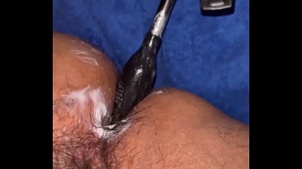 Homemade toy fucks tight ass