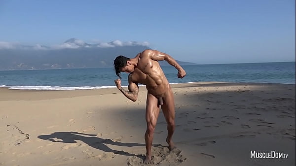 Muscle worship on the beach