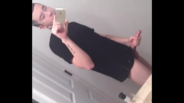 Cute tattooed teen rubbing his juicy cock and loving it