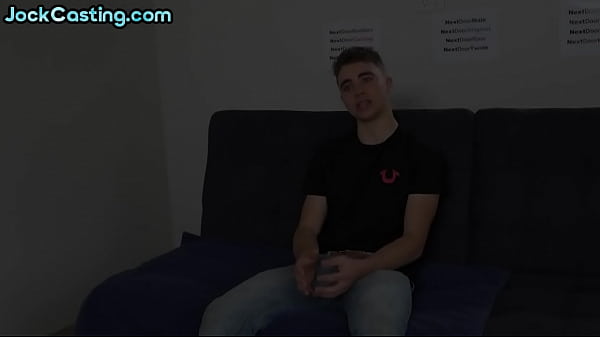 Twink gay with a big cock solo masturbates on couch