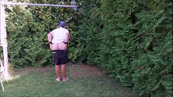 naked uncut slave exposed outdoor in penis cage striptease and dildoplay BDSM CBT
