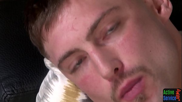 Hunky inked soldier wanking his oiledup dick