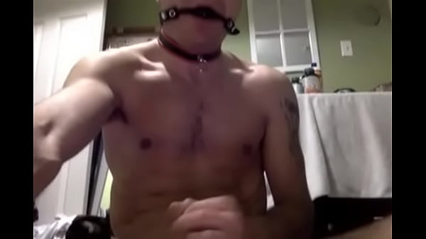 Crazy fucking horny mess fucks a fleshlight while sucking on a dildo with a ball gag and butt plug